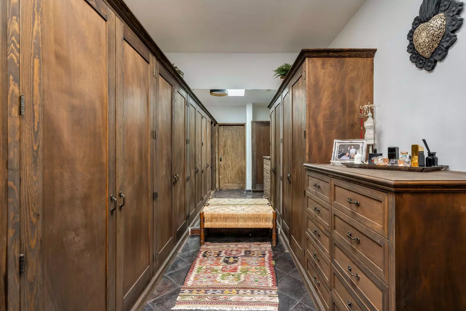 Casa Azul — Balcones, San Miguel de Allende — photo 16 — elegant walk-in closet, rustic wood finishes