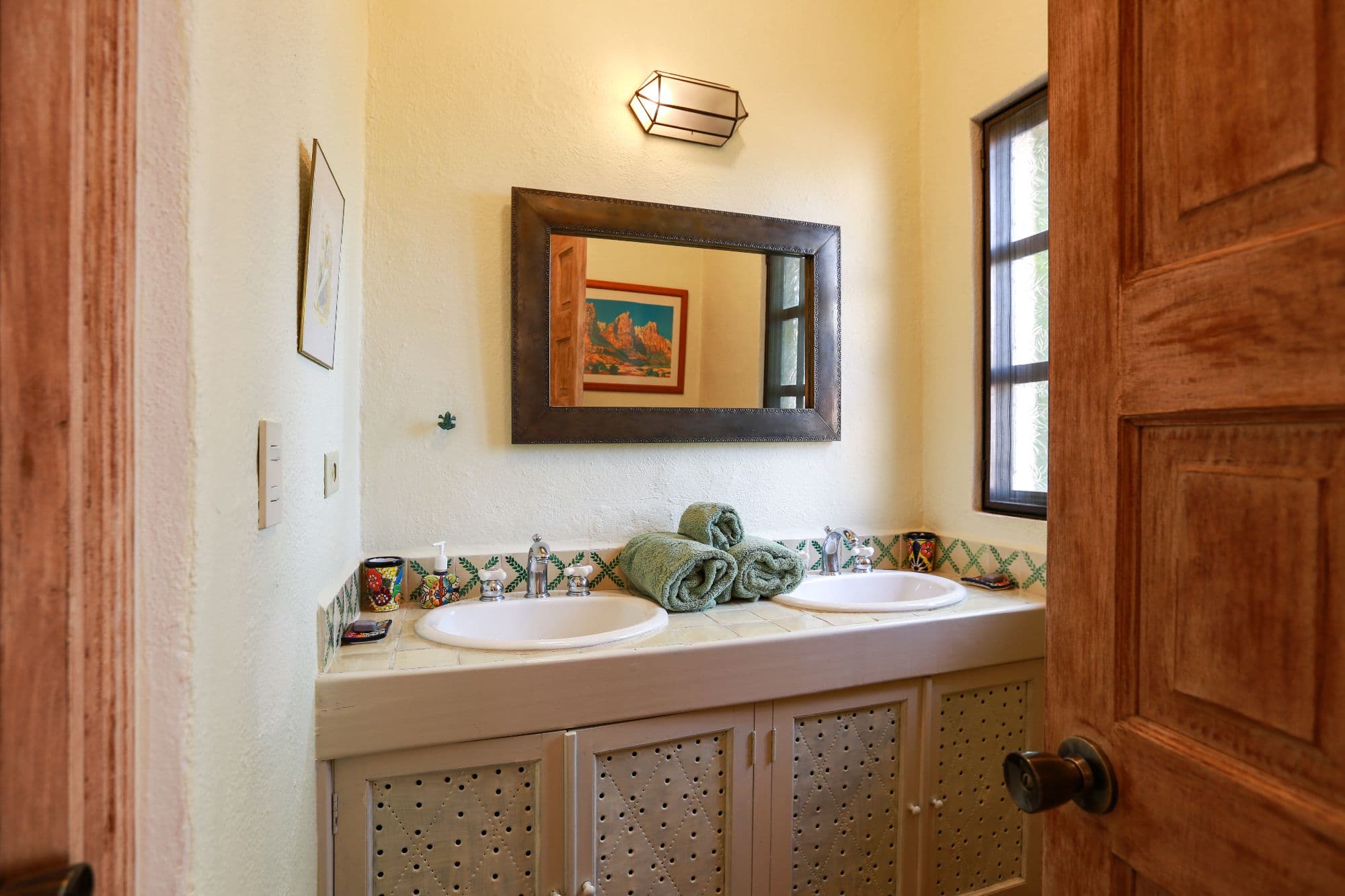 Casa Baeza — San Miguel de Allende Centro, San Miguel de Allende — photo 14 — charming dual-sink mexican bathroom oasis