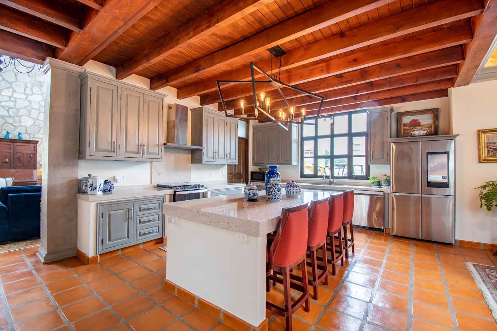 Casa Caterina — Las Campanas, San Miguel de Allende — photo 5 — rustic elegance meets modern luxury kitchen