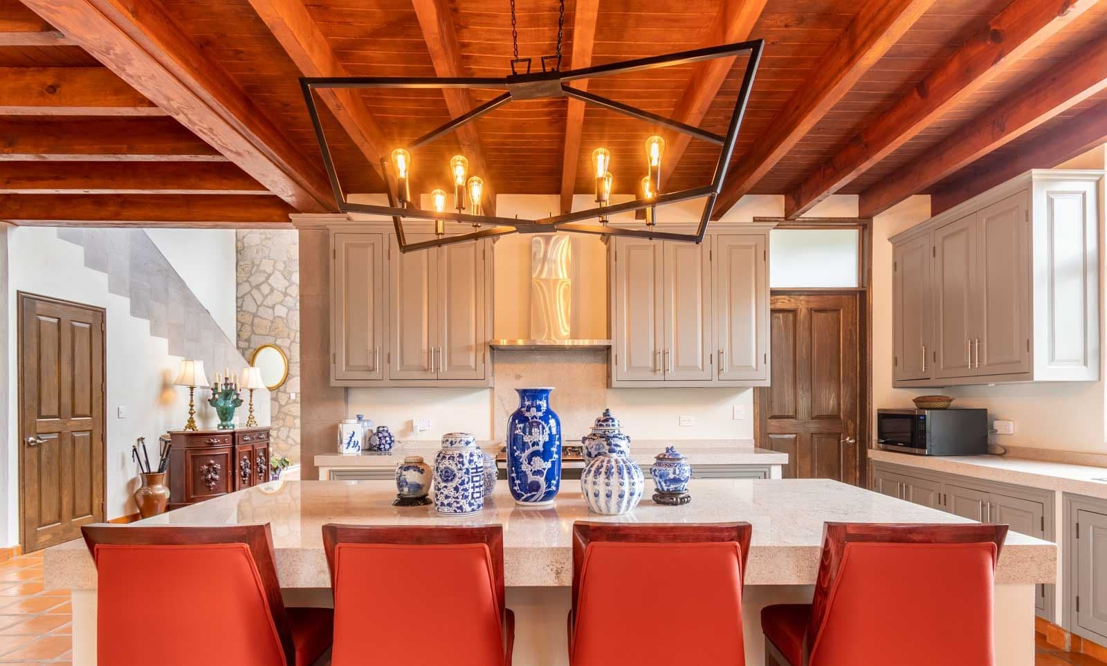 Casa Caterina — Las Campanas, San Miguel de Allende — photo 6 — sophisticated kitchen with soaring timber ceilings