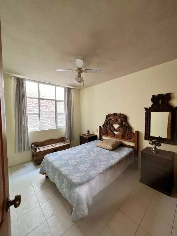 Cielito Lindo — Guadalupe, San Miguel de Allende — photo 7 — sunlit bedroom with colonial character