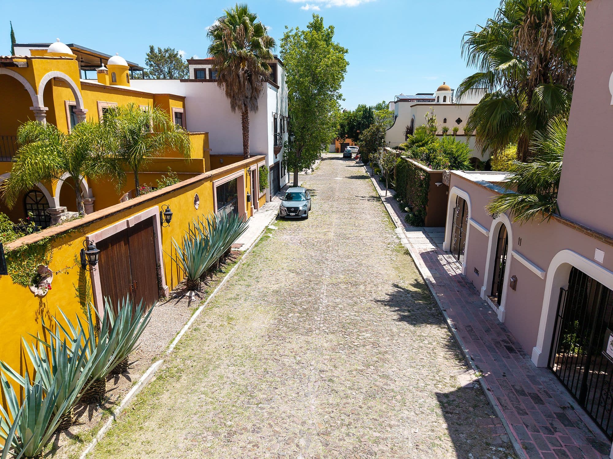 Casa Fuente — Atascadero (Arcos de San Miguel), San Miguel de Allende — photo 19 — charming cobblestone street, vibrant colonial architecture