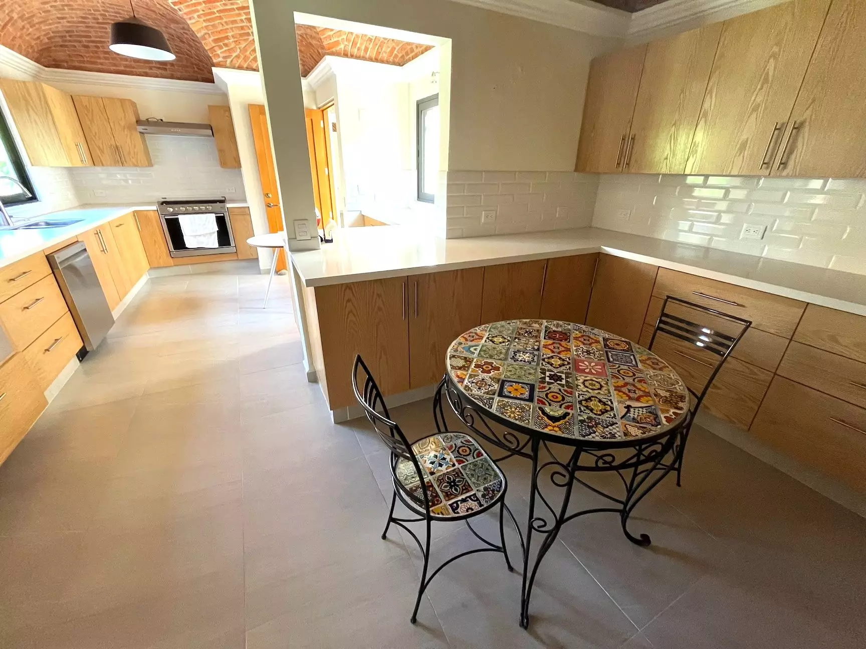 Casa Fuente — Atascadero (Arcos de San Miguel), San Miguel de Allende — photo 6 — luminous contemporary kitchen, artisan charm