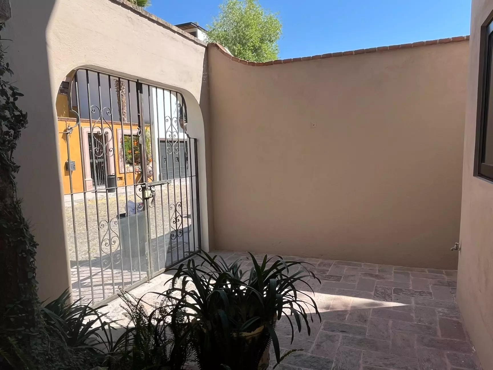 Casa Fuente — Atascadero (Arcos de San Miguel), San Miguel de Allende — photo 15 — sun-drenched courtyard, wrought-iron elegance