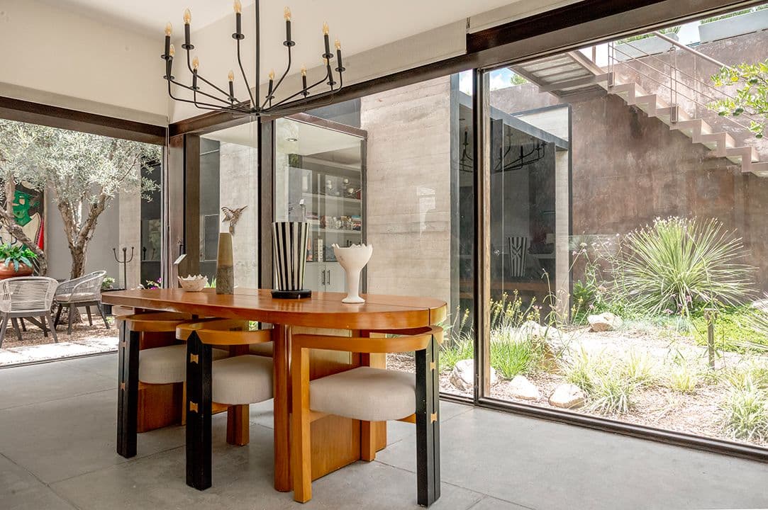 CASA SANCHEZ RENERO — Balcones, San Miguel de Allende — photo 9 — sophisticated dining with seamless garden integration