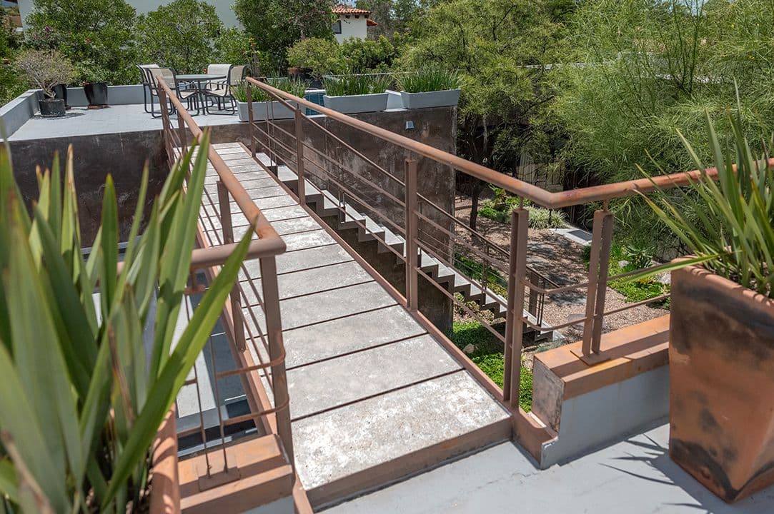 CASA SANCHEZ RENERO — Balcones, San Miguel de Allende — photo 23 — elevated terrace with lush botanical views