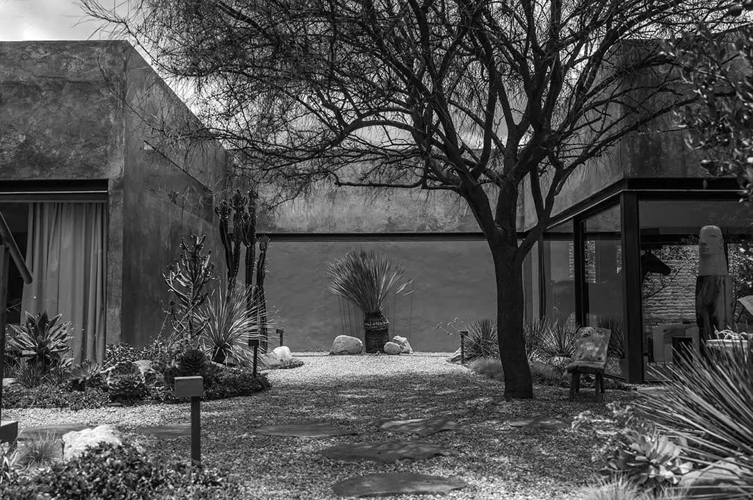 CASA SANCHEZ RENERO — Balcones, San Miguel de Allende — photo 20 — serene courtyard embracing waterfront tranquility