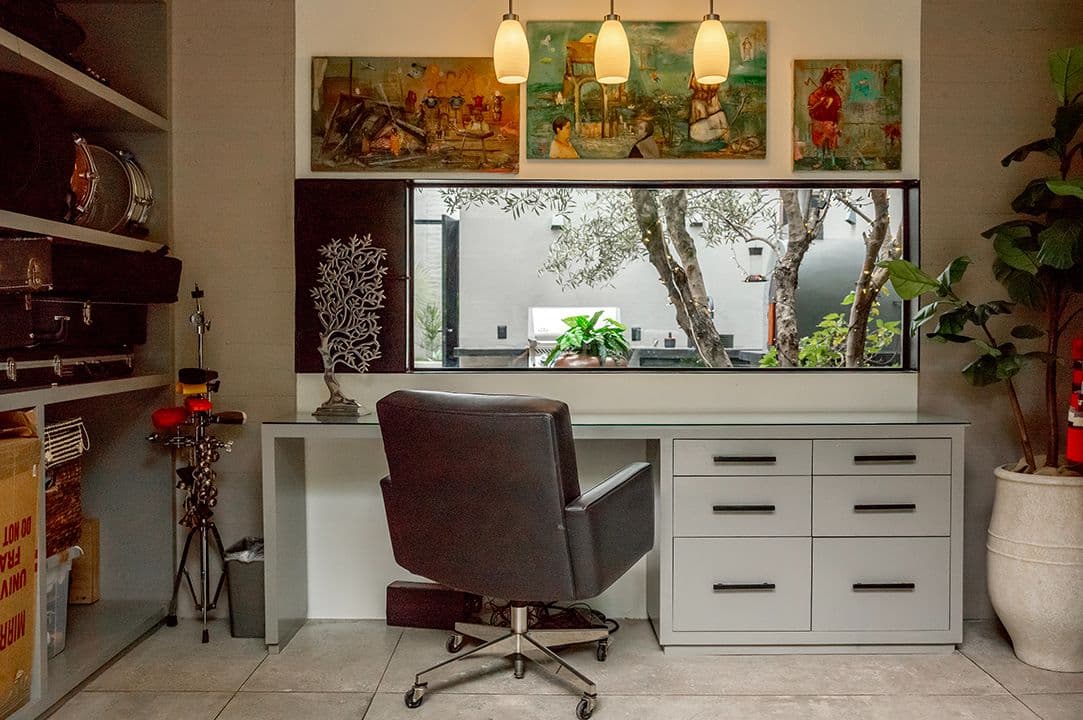 CASA SANCHEZ RENERO — Balcones, San Miguel de Allende — photo 15 — luminous workspace with serene garden views
