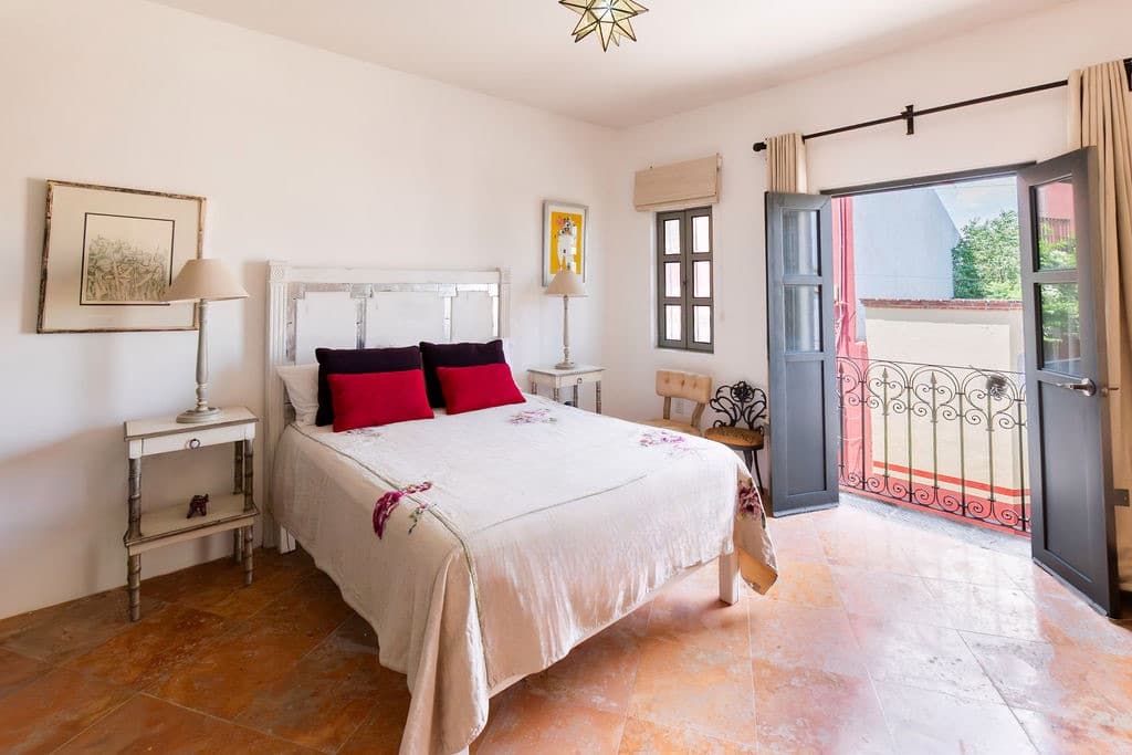 CASA TENERIAS — Centro, San Miguel de Allende — photo 4 — luminous master suite with terrace views
