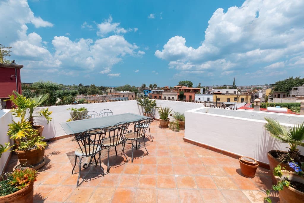 CASA TENERIAS — Centro, San Miguel de Allende — photo 26 — expansive rooftop terrace with panoramic city views