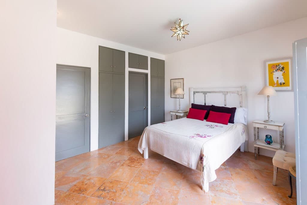 CASA TENERIAS — Centro, San Miguel de Allende — photo 21 — serene master suite, terracotta charm