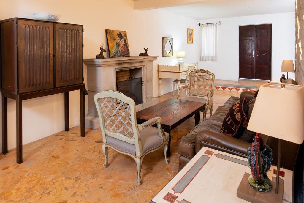CASA TENERIAS — Centro, San Miguel de Allende — photo 10 — elegant colonial living with fireplace