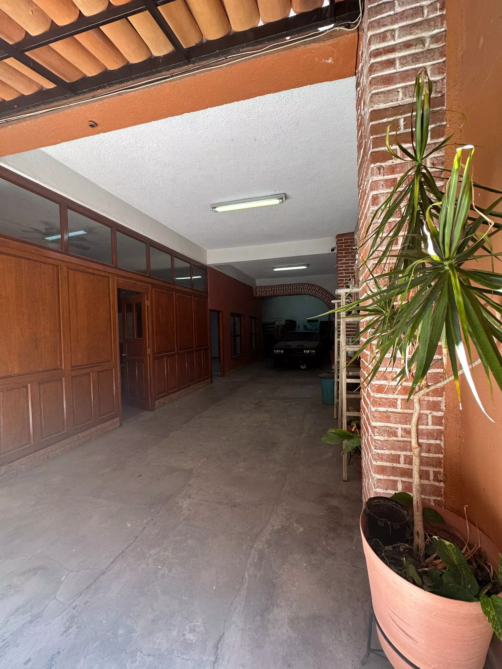 Casa San Antonio 20 Enero — San Antonio, San Miguel de Allende — photo 2 — charming covered courtyard with rustic brick details