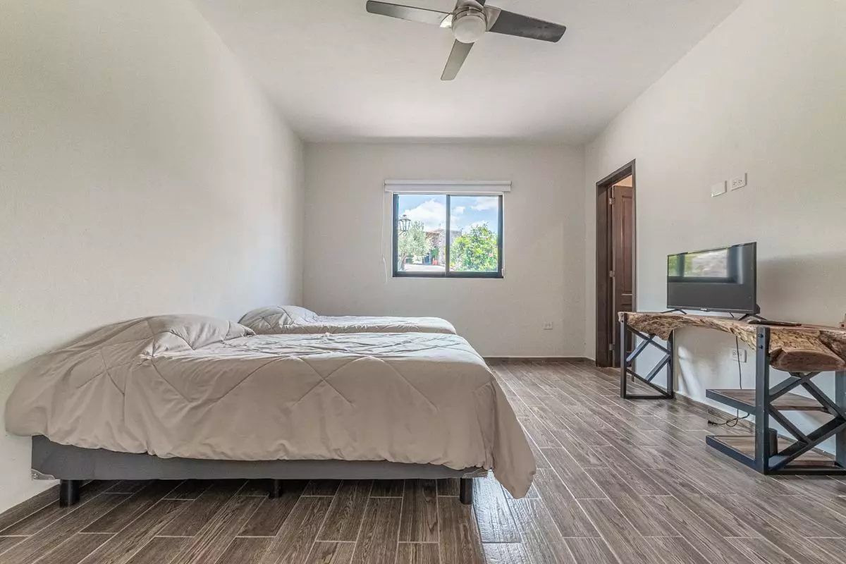 Casa Atardecer — Antigua Residencial, San Miguel de Allende — photo 7 — serene primary suite, abundant natural light