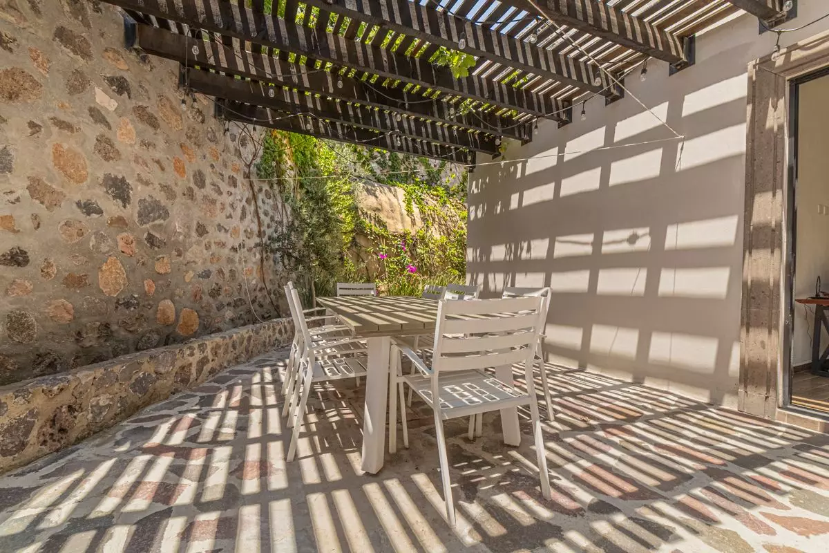 Casa Atardecer — Antigua Residencial, San Miguel de Allende — photo 9 — dappled sunlight, charming stone patio
