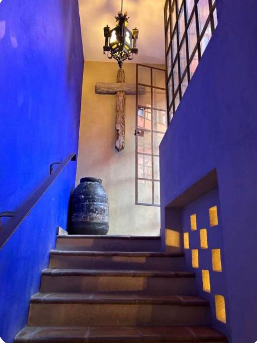 Casa Bebe — San Antonio, San Miguel de Allende — photo 8 — dramatic stairwell with spiritual charm