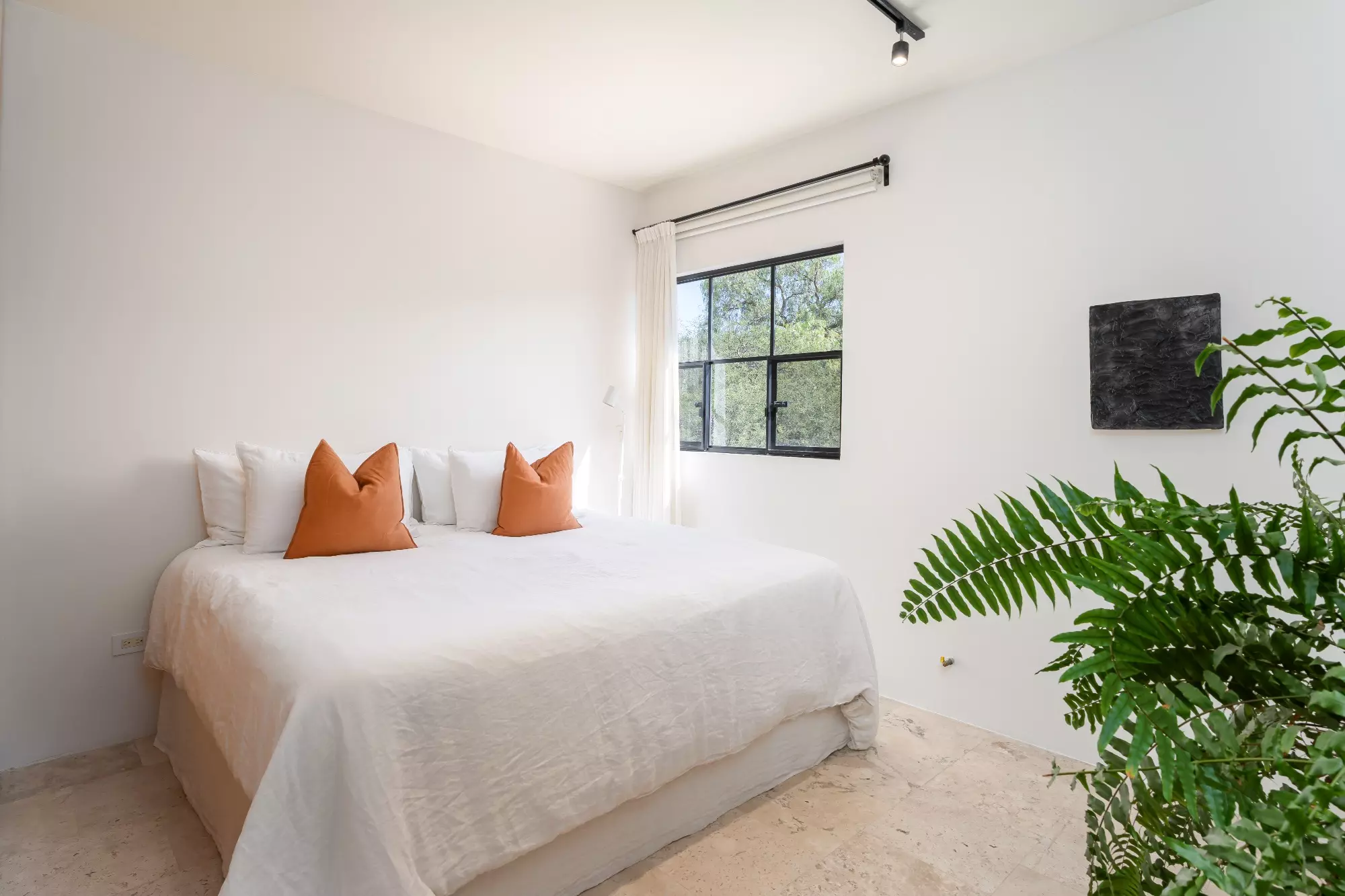 Casa Nómada — San Antonio, San Miguel de Allende — photo 16 — serene bedroom with abundant natural light