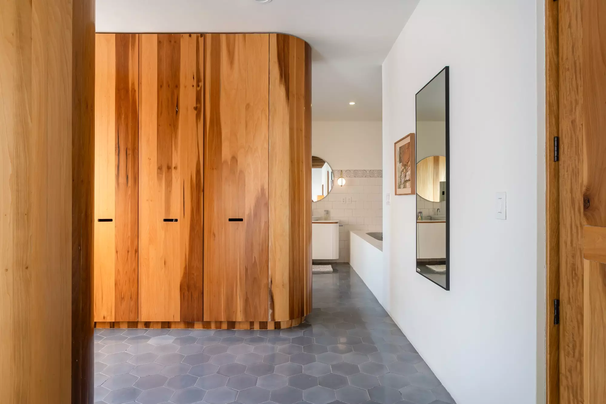 Casa Nómada — San Antonio, San Miguel de Allende — photo 11 — warm wood cabinetry, refined minimalist design