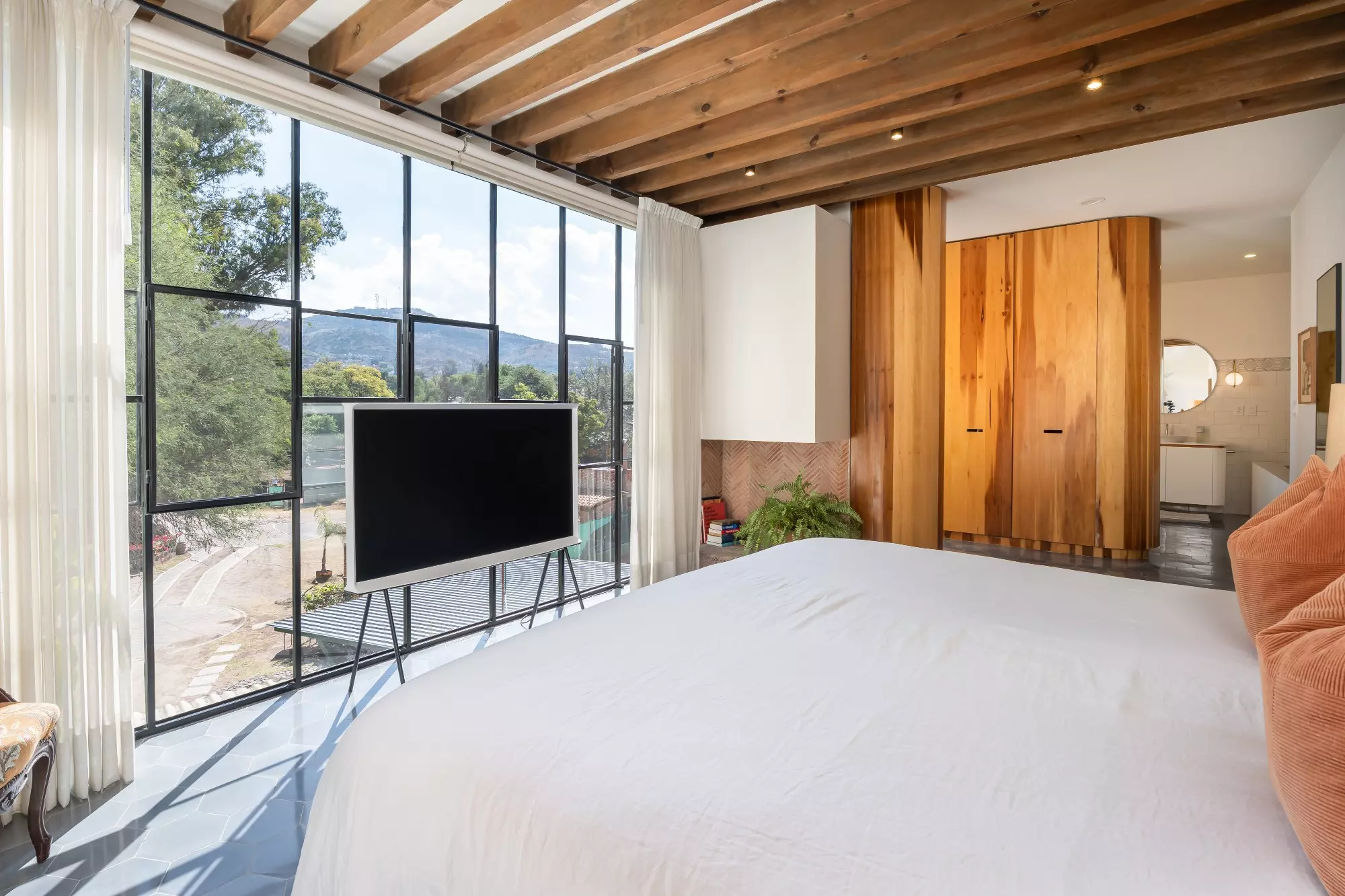 Casa Nómada — San Antonio, San Miguel de Allende — photo 10 — light-filled bedroom, mountain views, refined