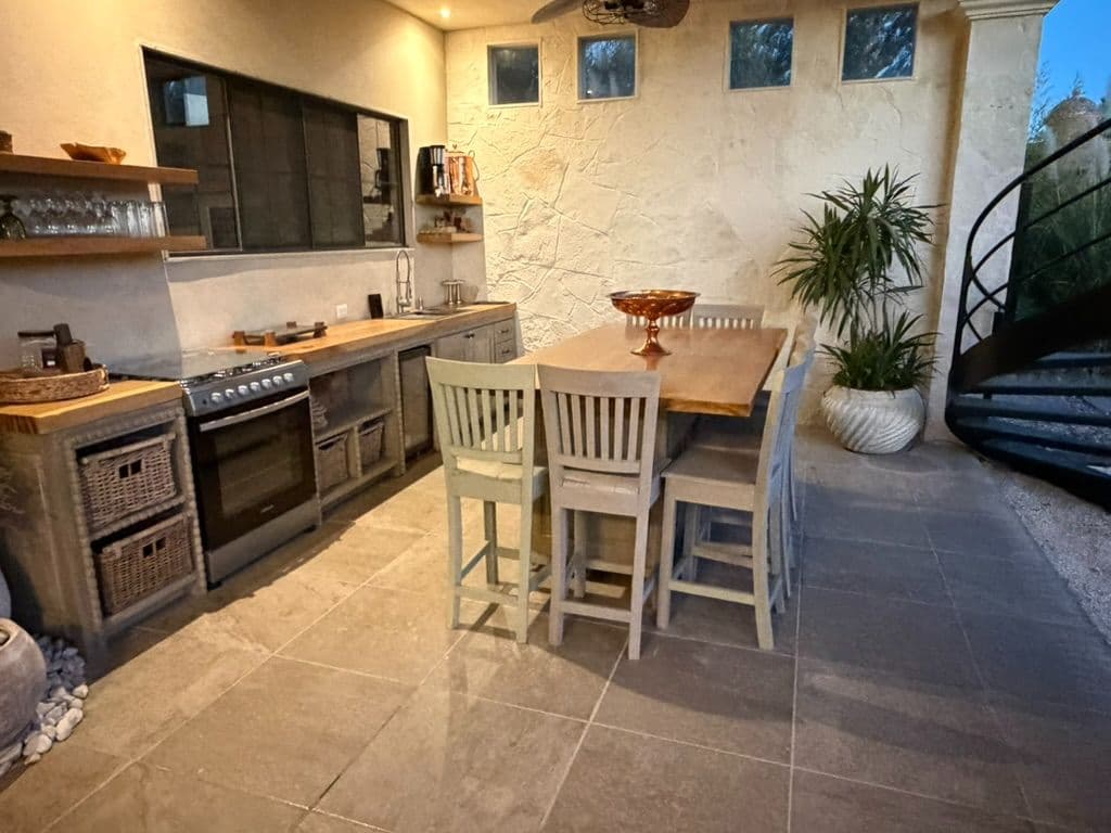 Casa Shanti Rancho Labradores — Los Labradores, San Miguel de Allende — photo 10 — sophisticated open kitchen, warm ambient lighting