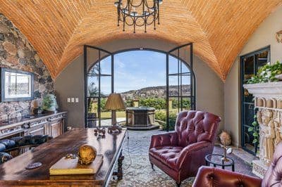 Casa Santuario — Balcones, San Miguel de Allende — photo 11 — soaring vaulted ceilings, panoramic mountain views