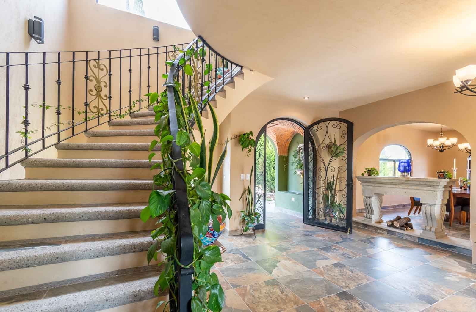 Casa Hacienda del Lago — Los Labradores, San Miguel de Allende — photo 5 — elegant staircase with ornamental ironwork
