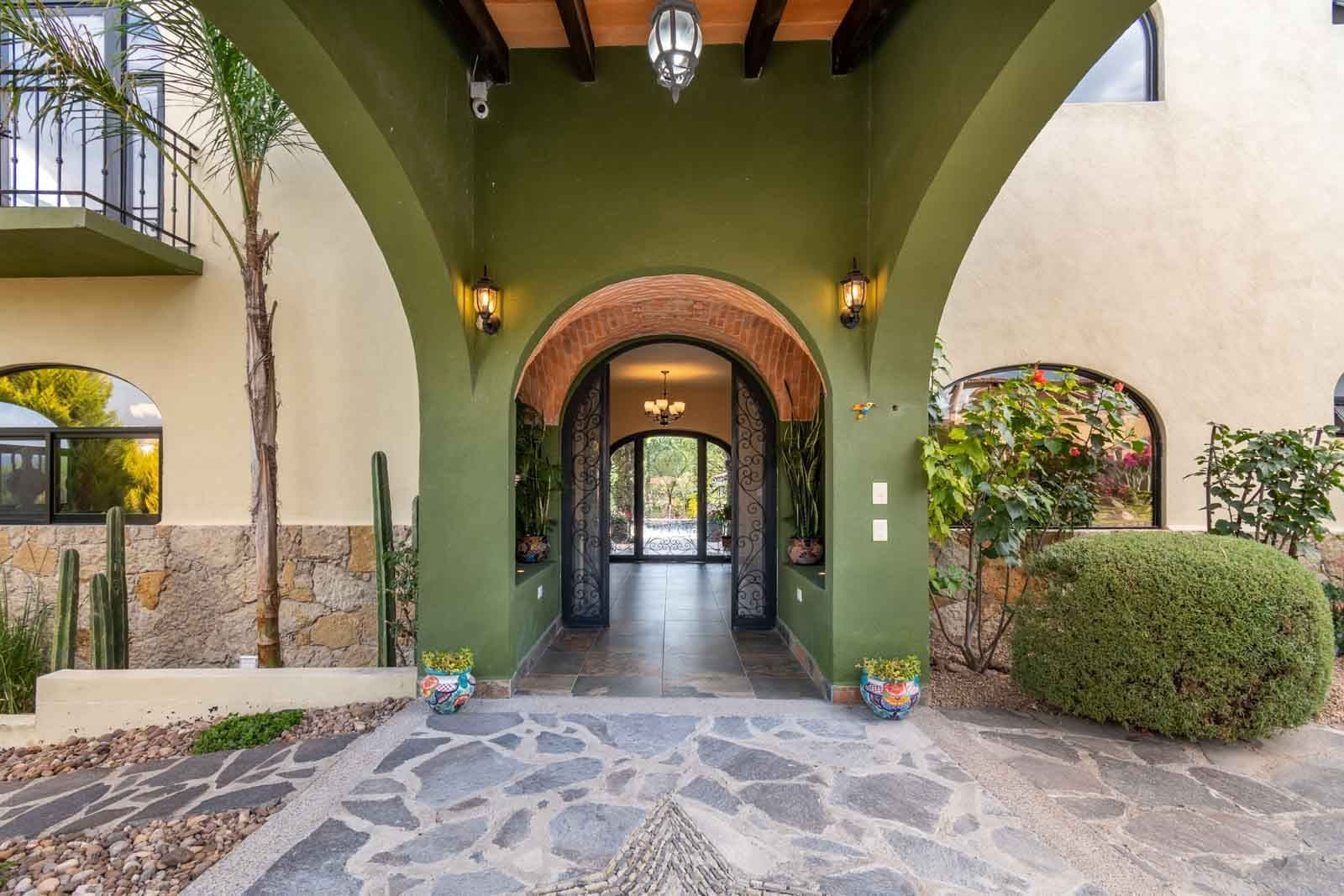 Casa Hacienda del Lago — Los Labradores, San Miguel de Allende — photo 4 — elegant arched entry, authentic colonial charm