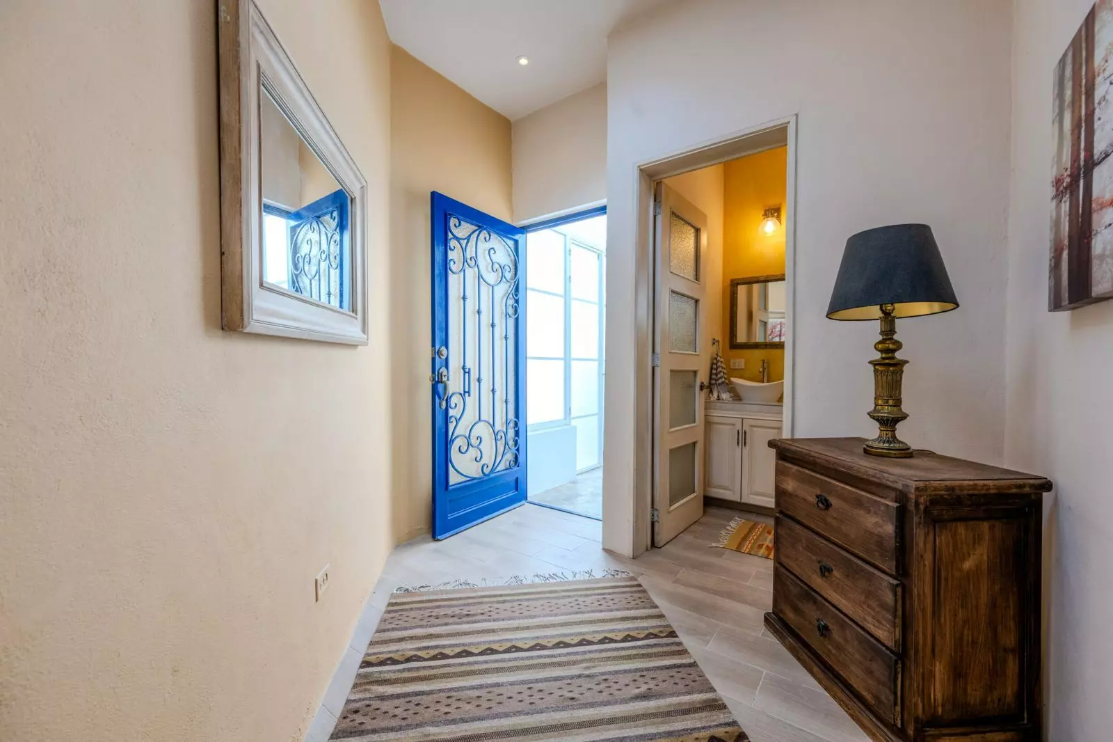 Casa Lenora — Atascadero (Arcos de San Miguel), San Miguel de Allende — photo 11 — elegant entry with cobalt architectural details