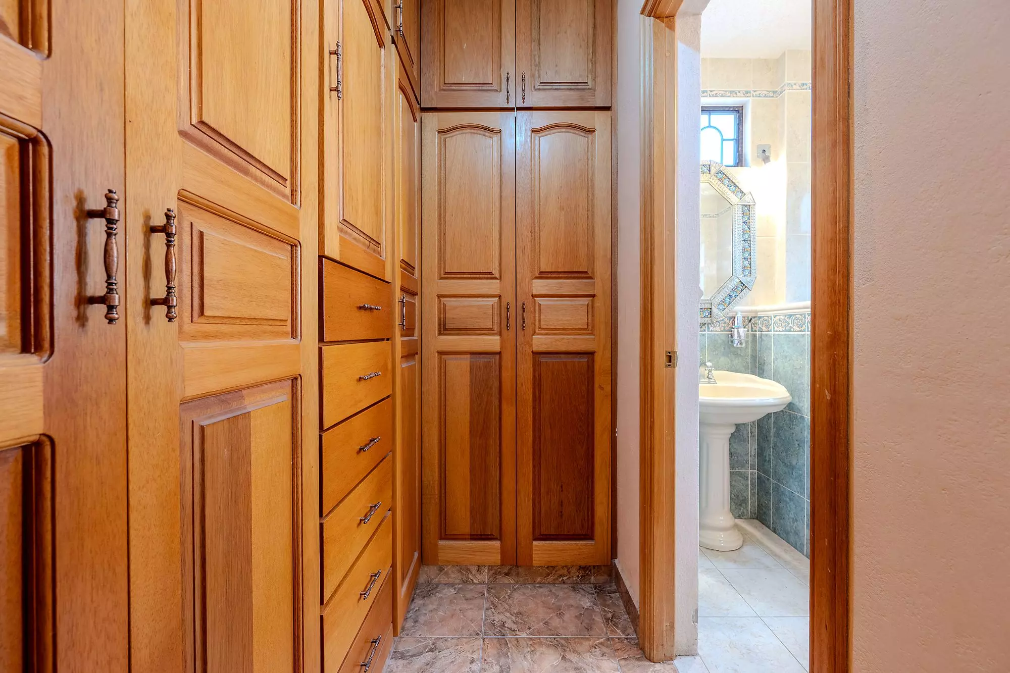 Casa Del Refugio — San Antonio, San Miguel de Allende — photo 25 — elegant wooden cabinetry, authentic craftsmanship