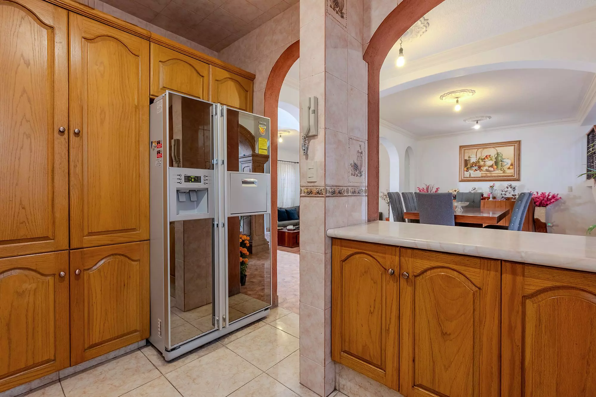 Casa Del Refugio — San Antonio, San Miguel de Allende — photo 11 — elegant traditional kitchen with warm wood cabinetry