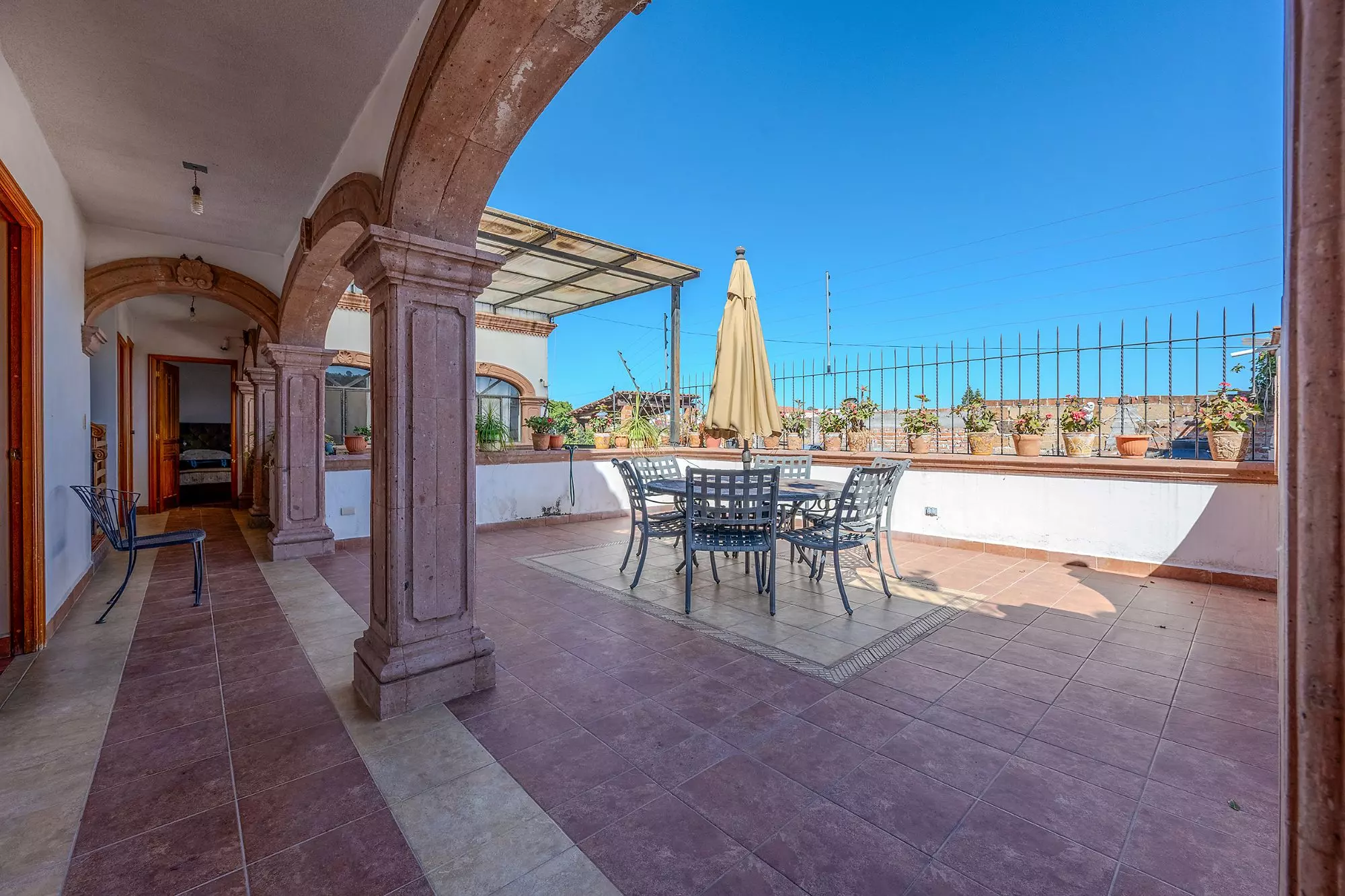 Casa Del Refugio — San Antonio, San Miguel de Allende — photo 29 — expansive rooftop terrace with stunning mountain views