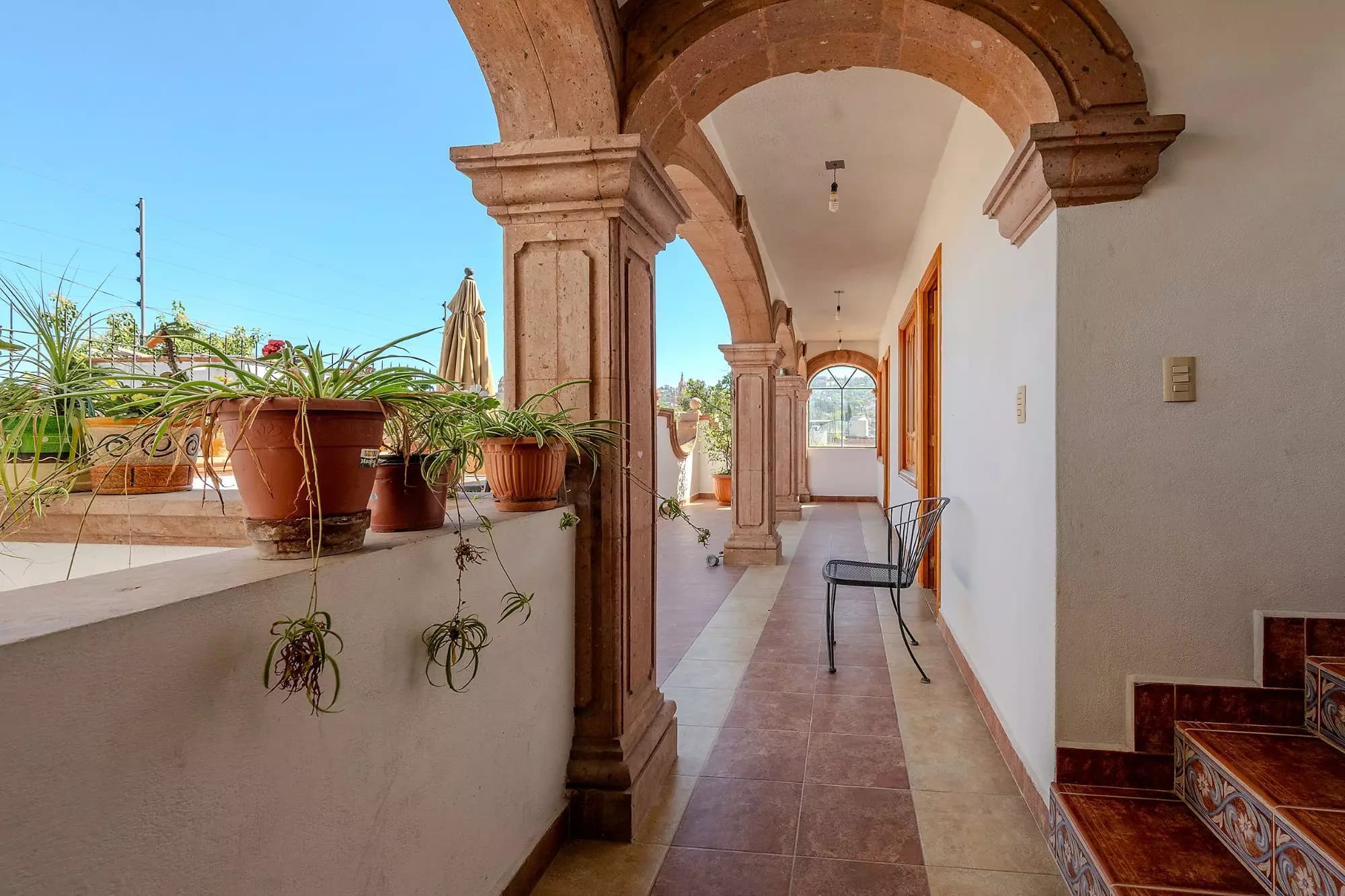 Casa Del Refugio — San Antonio, San Miguel de Allende — photo 30 — elegant colonial archway, sun-drenched terrace