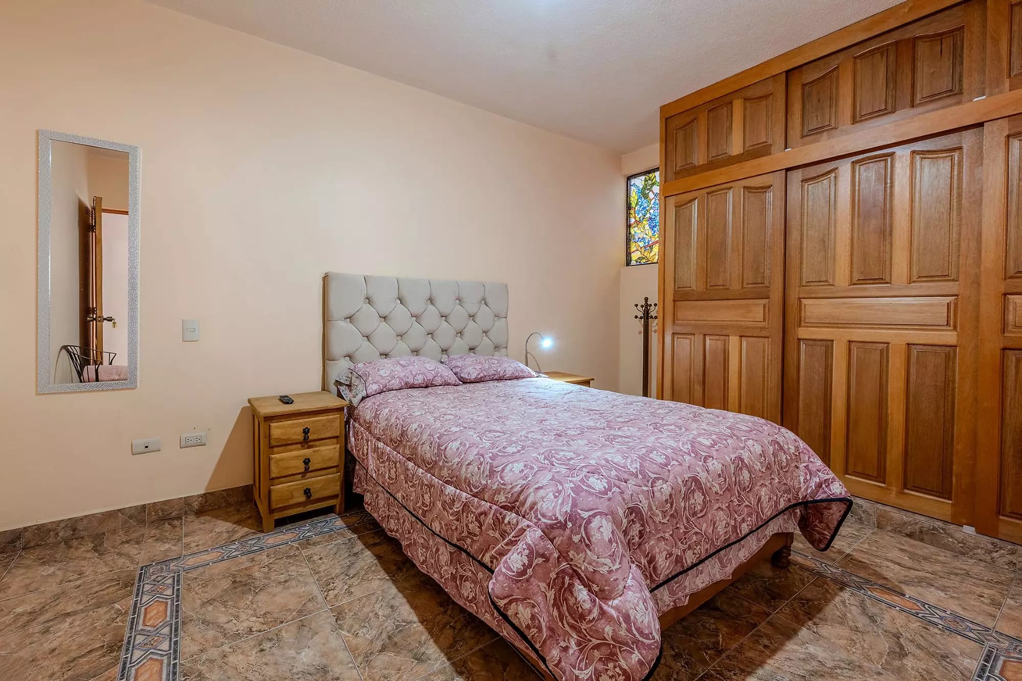 Casa Del Refugio — San Antonio, San Miguel de Allende — photo 22 — elegant master suite, wood-paneled luxury