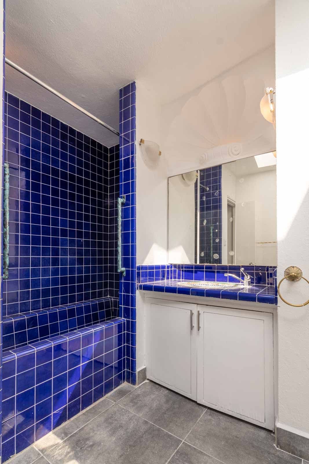 Casa Luz del Sol — Balcones, San Miguel de Allende — photo 26 — striking cobalt tile spa bathroom