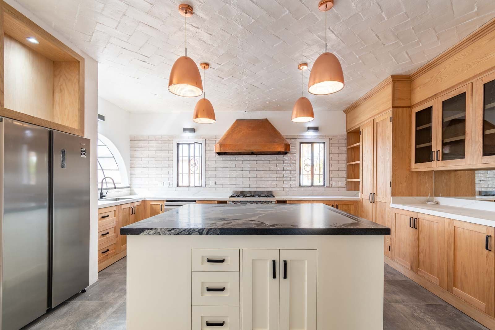Casa Luz del Sol — Balcones, San Miguel de Allende — photo 16 — contemporary chef's kitchen with artisanal warmth
