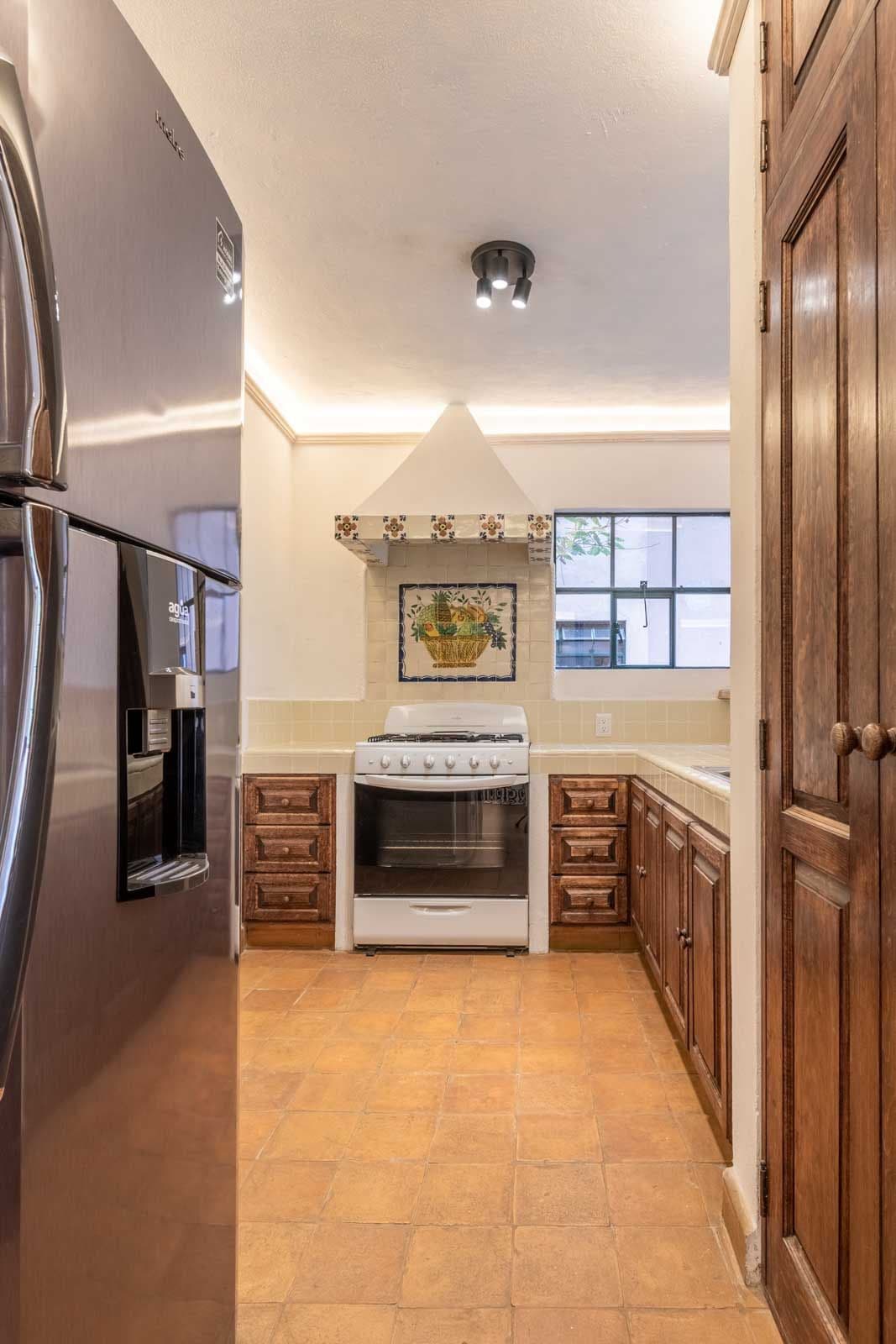 Santo Domingo Condo 3C — Centro, San Miguel de Allende — photo 8 — charming traditional kitchen, abundant natural light