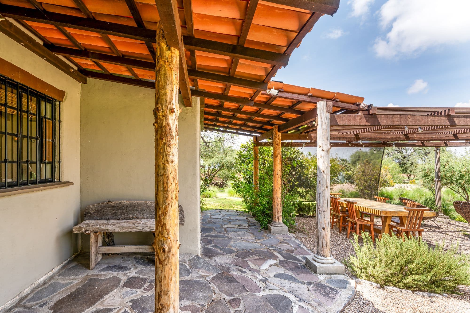 Ranchito Tierra y Cielo — Xote Area, San Miguel de Allende — photo 8 — rustic pergola embraces countryside serenity
