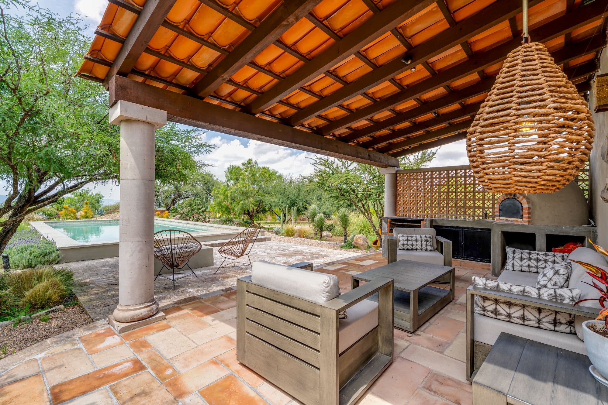 Ranchito Tierra y Cielo — Xote Area, San Miguel de Allende — photo 12 — sophisticated terrace overlooking serene pool gardens