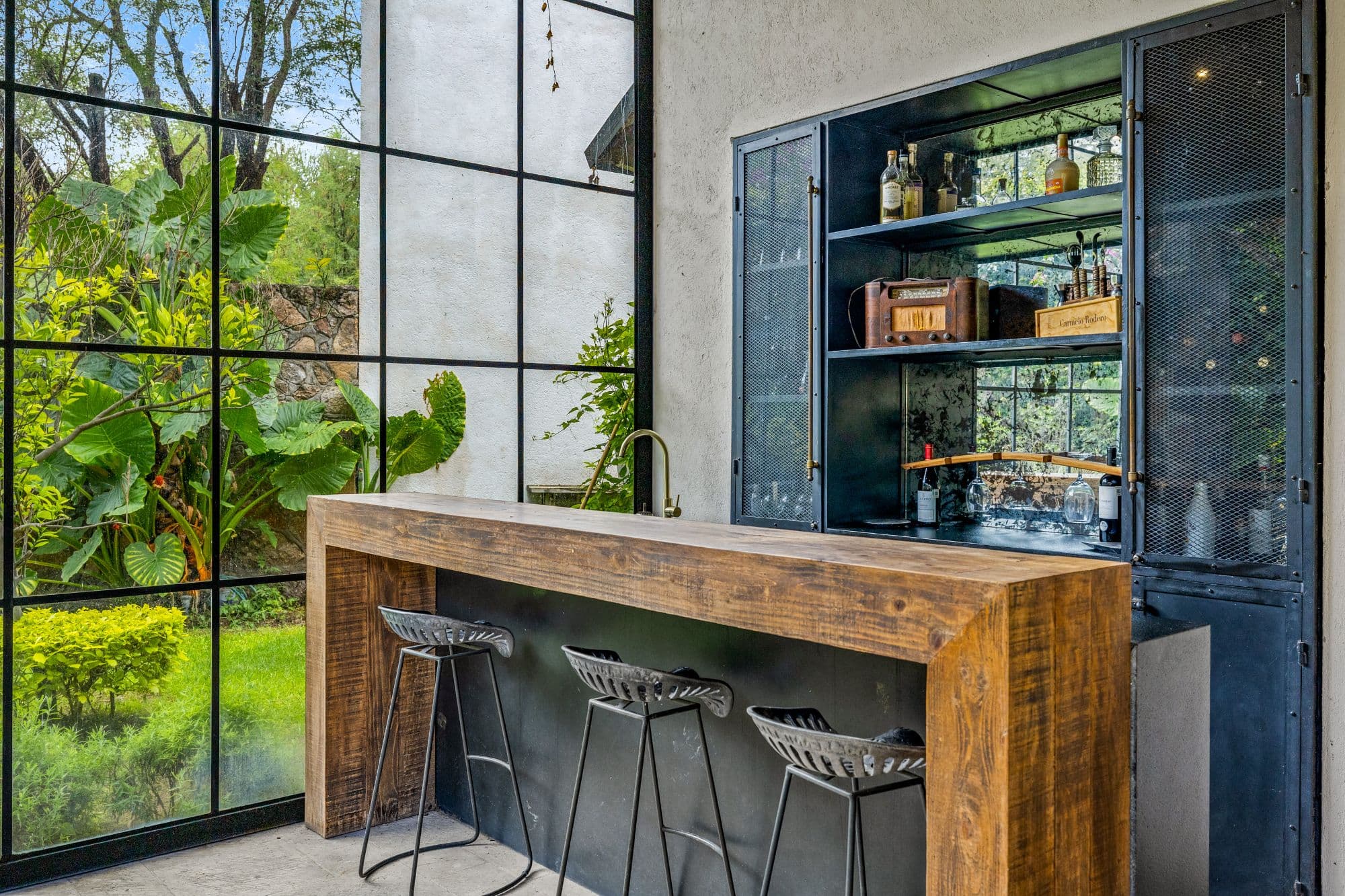 Huizaches Garden — Villa de los Frailes, San Miguel de Allende — photo 15 — sophisticated indoor-outdoor entertaining space
