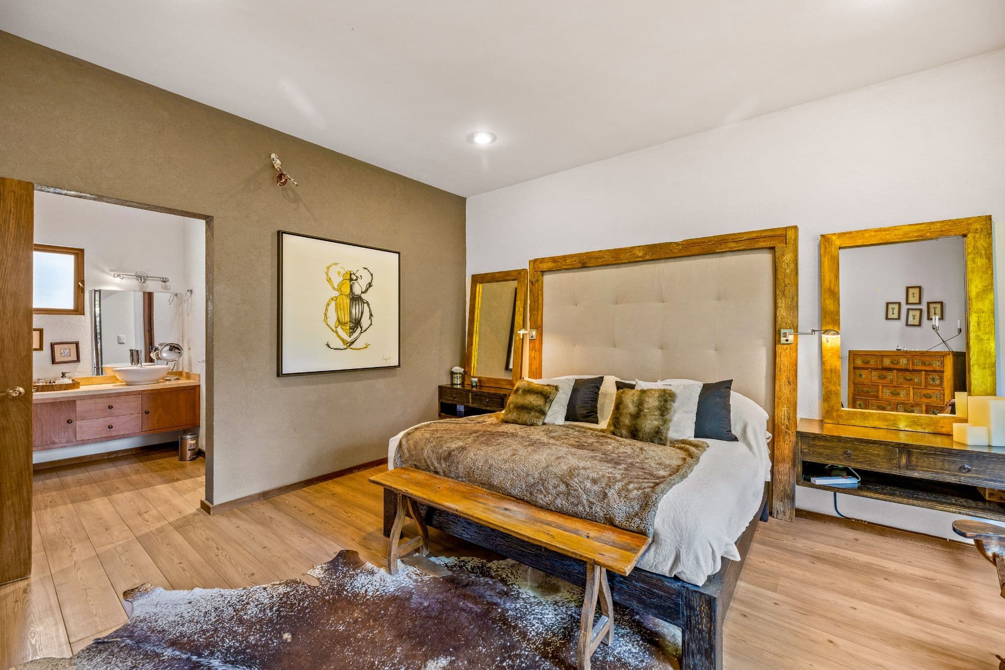 Huizaches Garden — Villa de los Frailes, San Miguel de Allende — photo 17 — sophisticated master suite, golden accents gleam