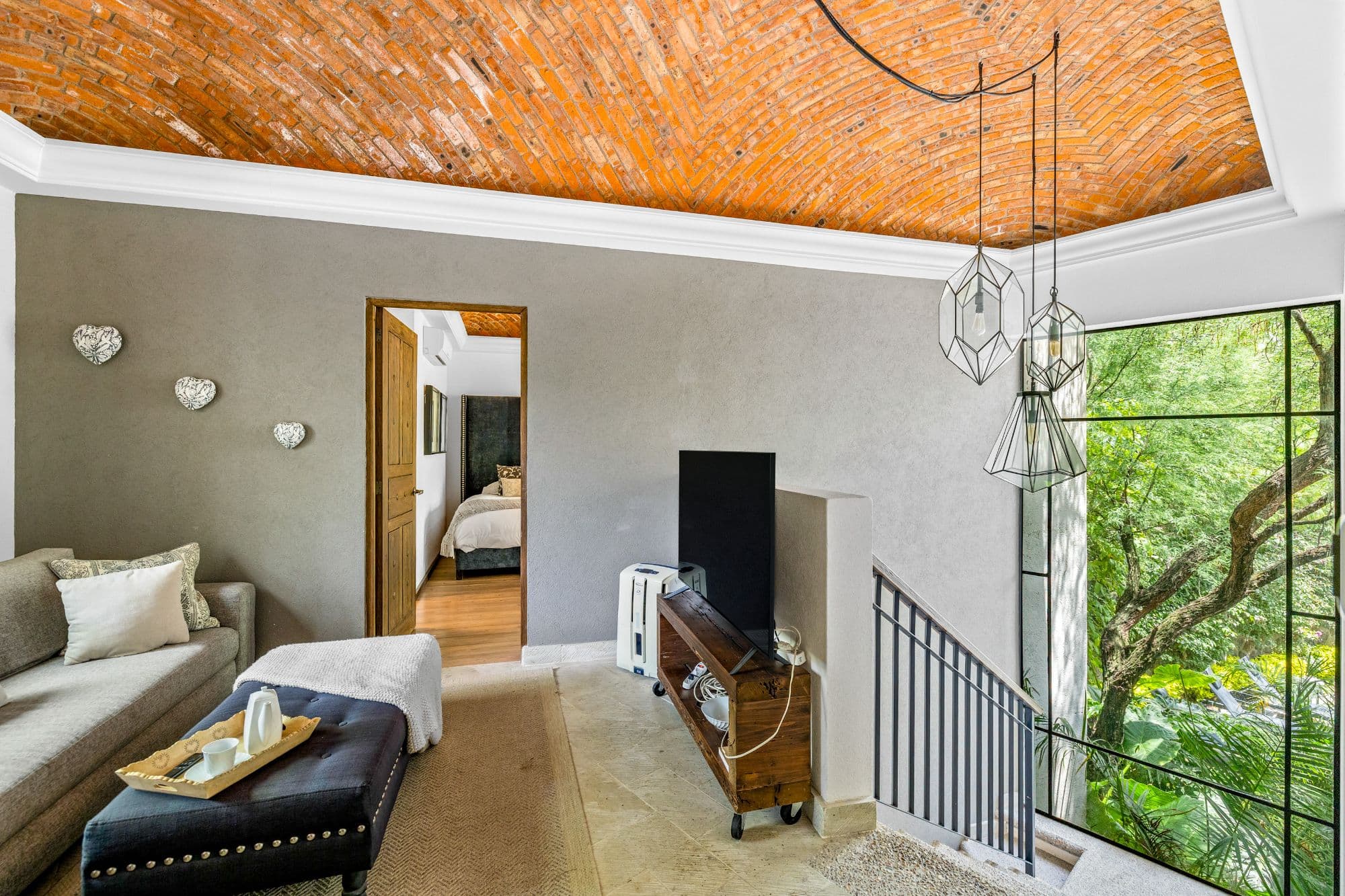 Huizaches Garden — Villa de los Frailes, San Miguel de Allende — photo 19 — soaring brick ceiling, lush garden views