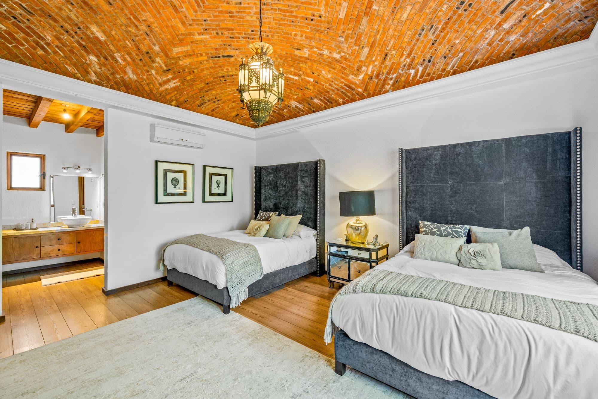 Huizaches Garden — Villa de los Frailes, San Miguel de Allende — photo 22 — soaring brick vault, dual queen beds