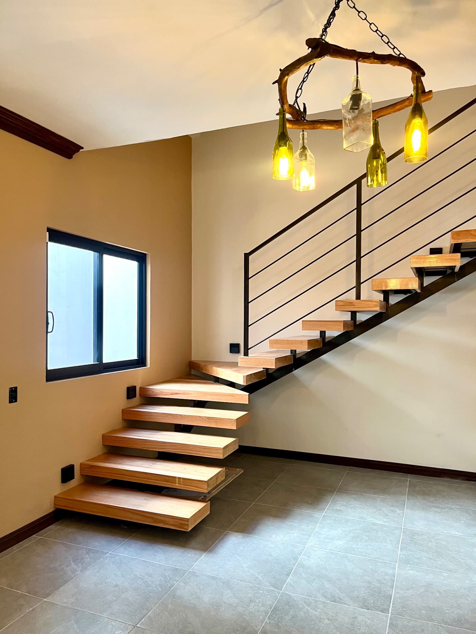 Casa Rivera — Independencia, San Miguel de Allende — photo 3 — stunning modern staircase, artisan lighting design