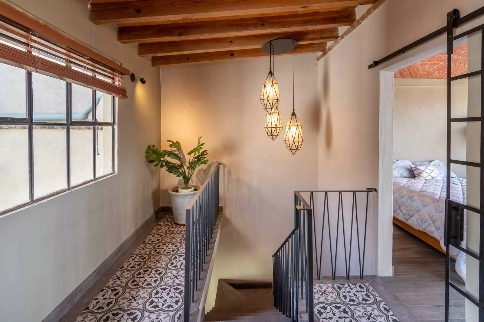 Casa Lúmina — Ojo de Agua, San Miguel de Allende — photo 20 — luminous loft with rustic wooden beams