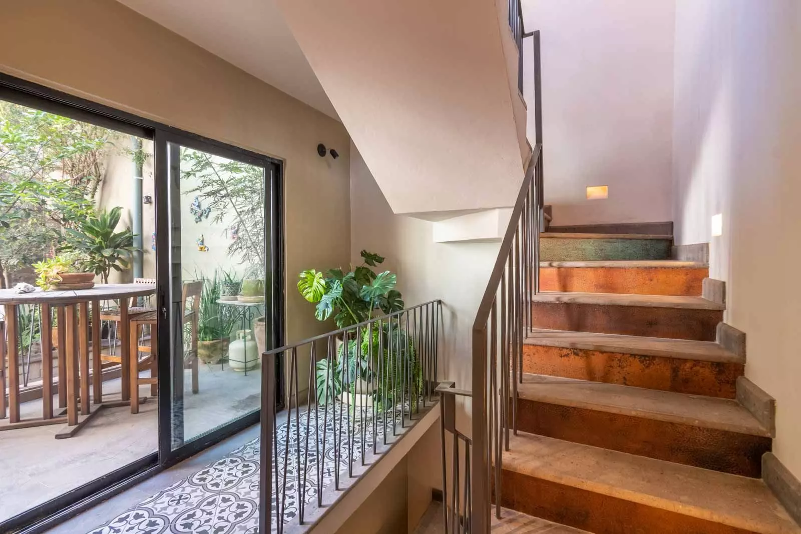 Casa Lúmina — Ojo de Agua, San Miguel de Allende — photo 19 — elegant staircase, light-filled terrace access