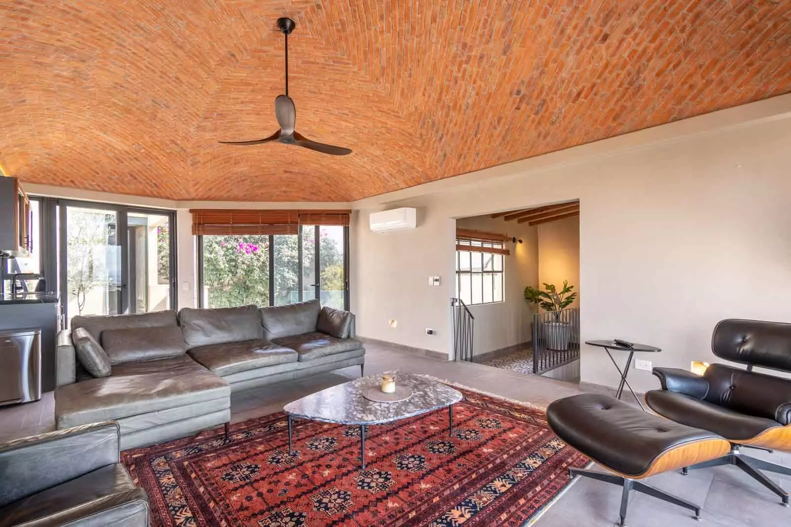 Casa Lúmina — Ojo de Agua, San Miguel de Allende — photo 23 — sophisticated living space, soaring timber ceilings