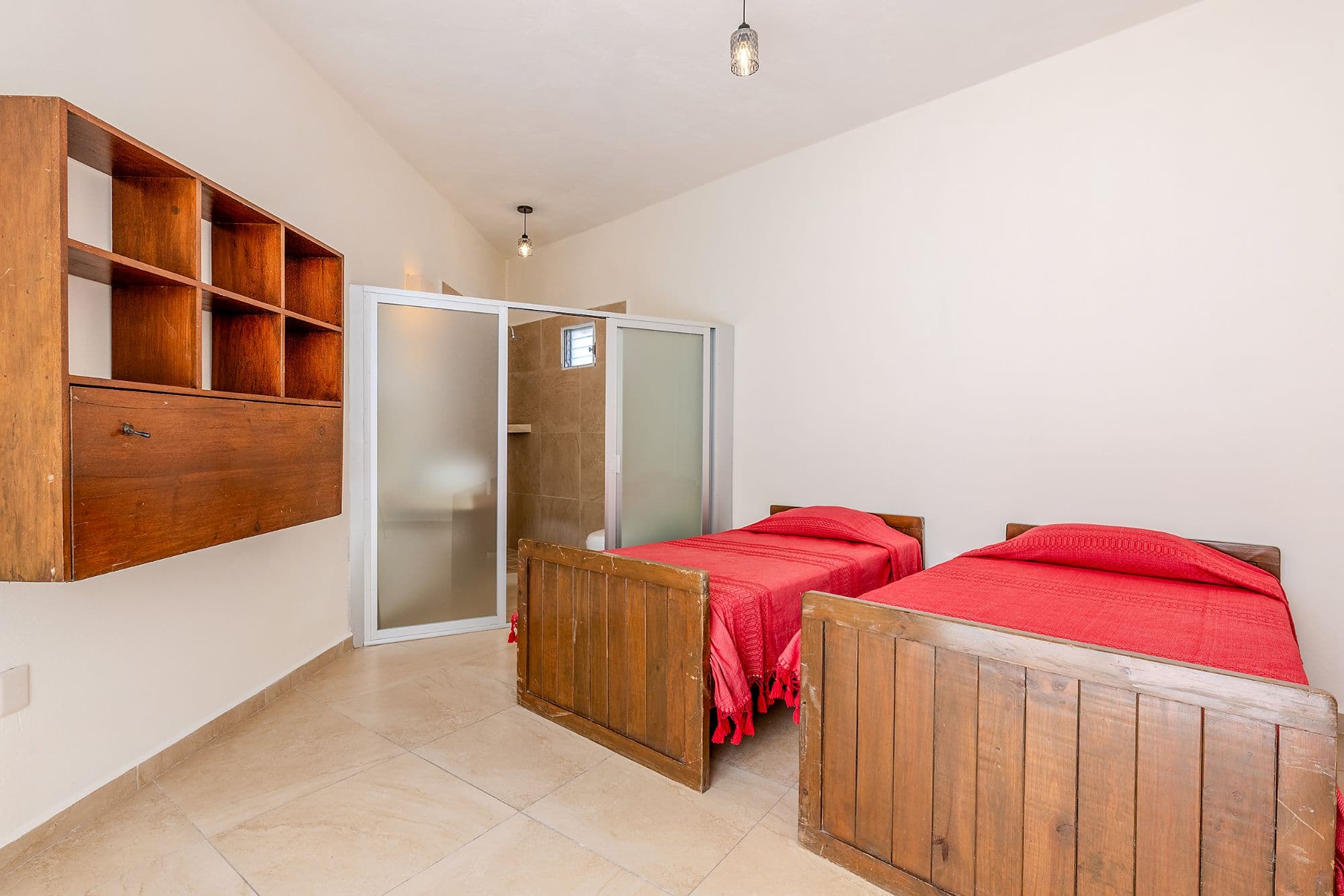 Casita Amanecer — Las Brisas, San Miguel de Allende — photo 21 — charming dual bedroom with rustic wood character