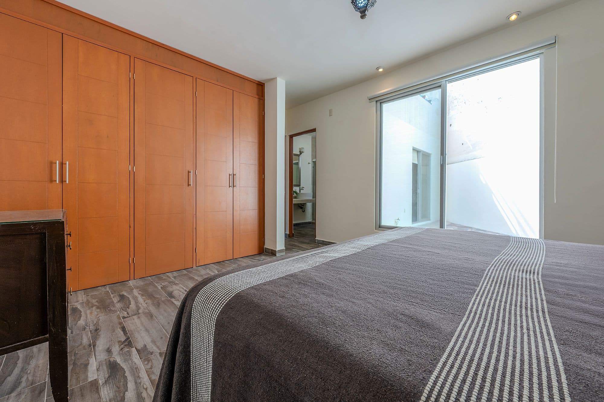 Casita Amanecer — Las Brisas, San Miguel de Allende — photo 14 — luminous master suite with terrace views