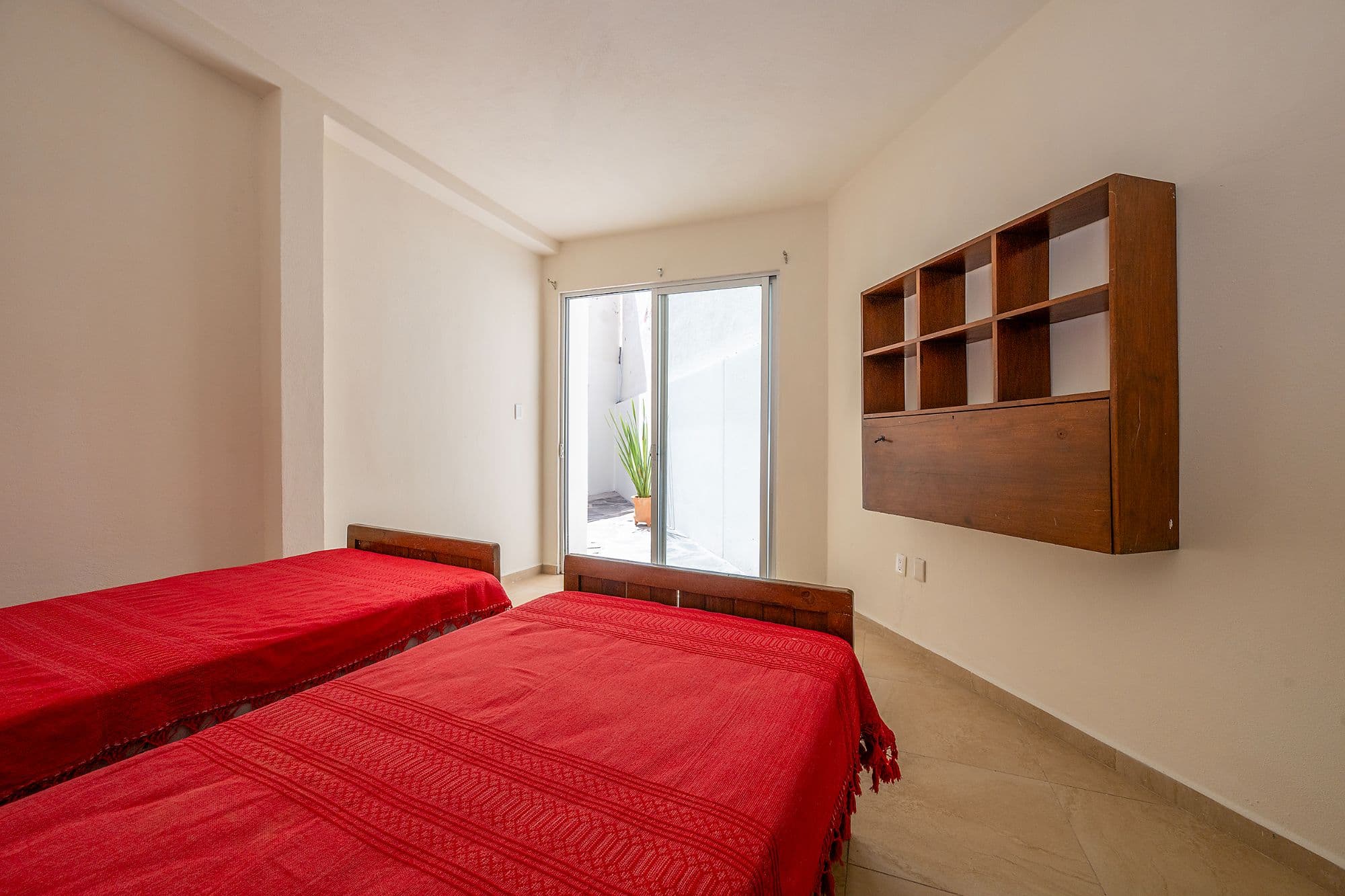 Casita Amanecer — Las Brisas, San Miguel de Allende — photo 23 — bright bedroom with terraced access