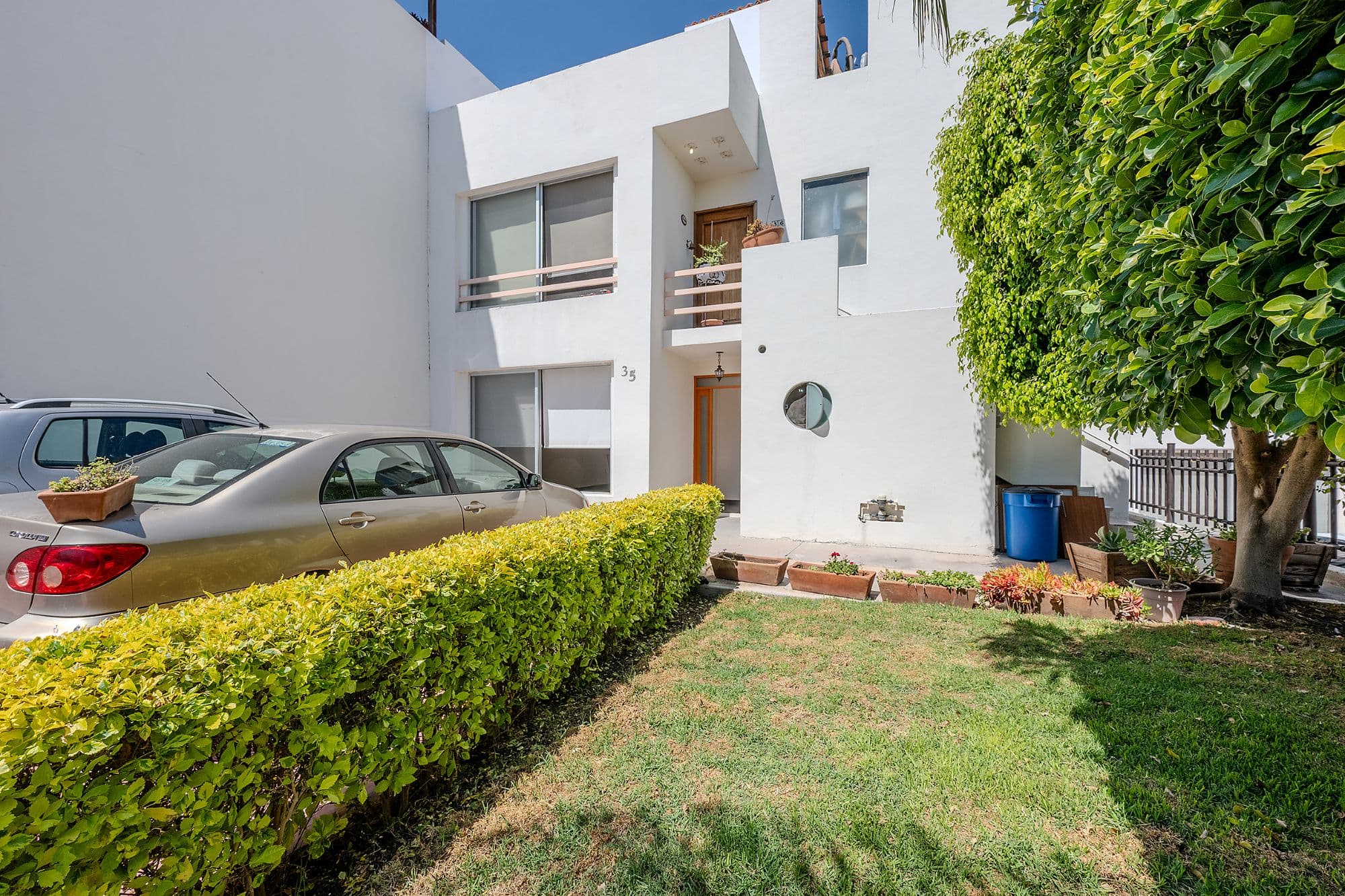 Casita Amanecer — Las Brisas, San Miguel de Allende — photo 25 — contemporary white home, verdant gardens, luminous
